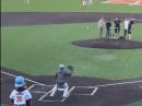 A screenshot from the video of a robot throwing the first pitch, controlled by ham radio.